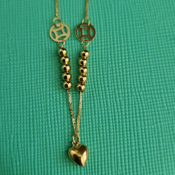 18k Bracelet with small balls and cute money catcher design as charm - Picture 4 of 16